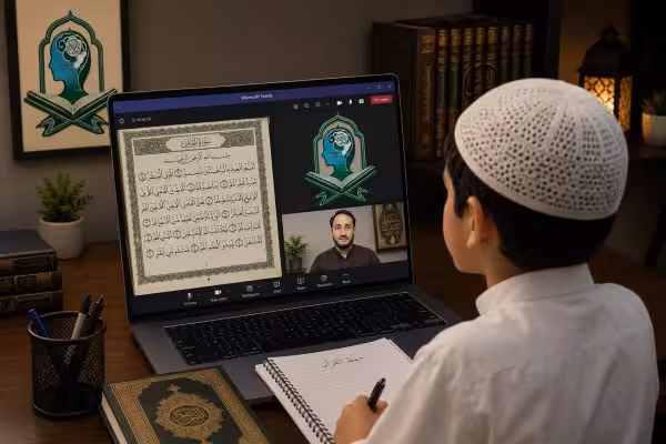 Young student learning Hifz Quran online with a qualified tutor through a live interactive lesson on laptop